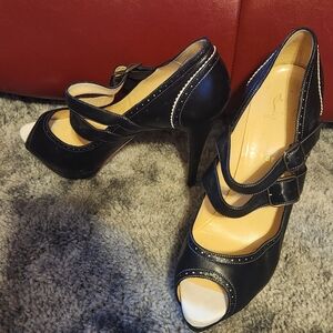 Christian Louboutin black size 10